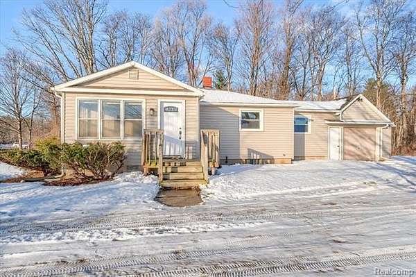 1.5 Acres of Residential Land with Home for Sale in North Branch, Michigan