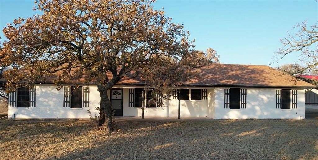 4.68 Acres of Residential Land with Home for Sale in Poolville, Texas