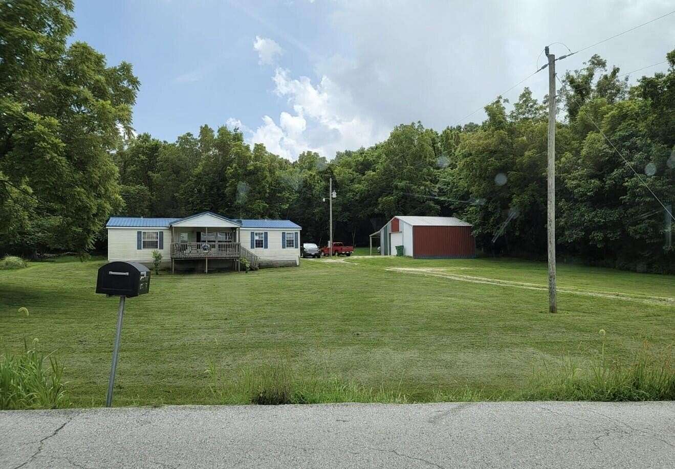 2.38 Acres of Residential Land with Home for Sale in Marshfield, Missouri