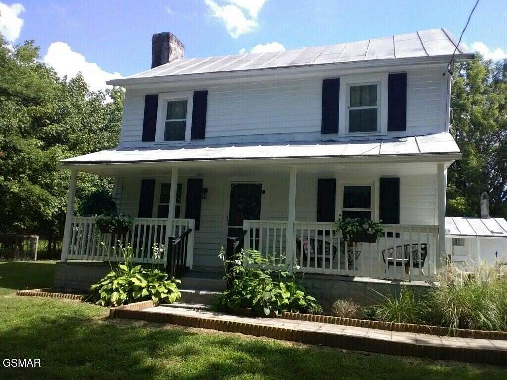 30 Acres of Agricultural Land with Home for Sale in Sevierville, Tennessee