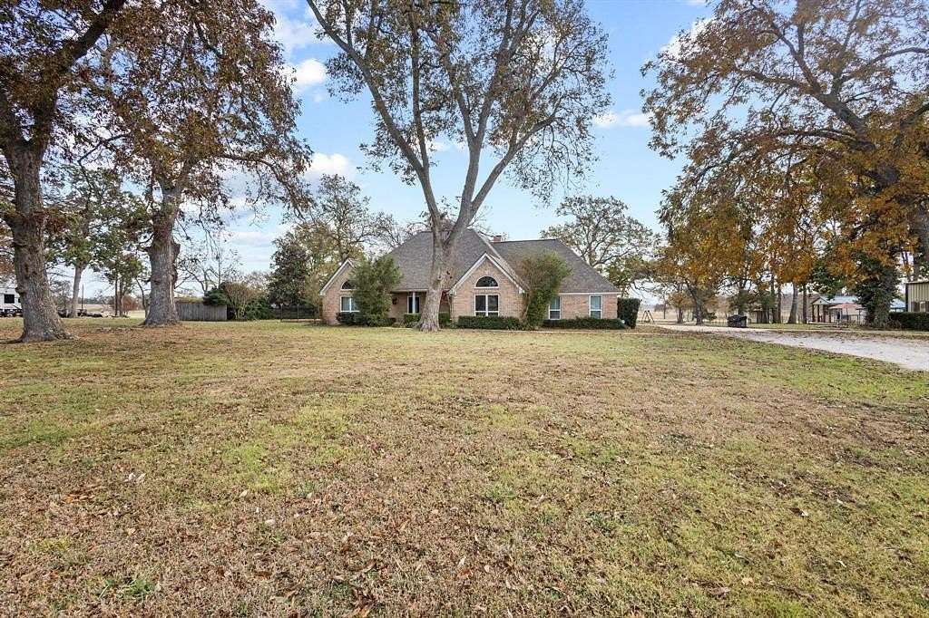 6.38 Acres of Land with Home for Sale in Honey Grove, Texas