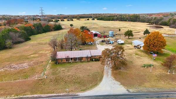 58 Acres of Agricultural Land with Home for Sale in Decatur, Texas