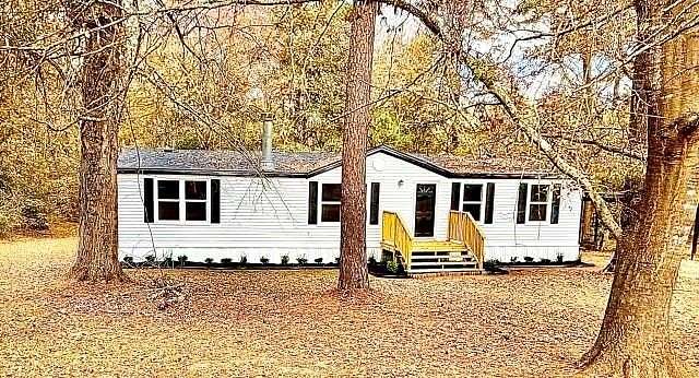 2.56 Acres of Residential Land with Home for Sale in Longview, Texas