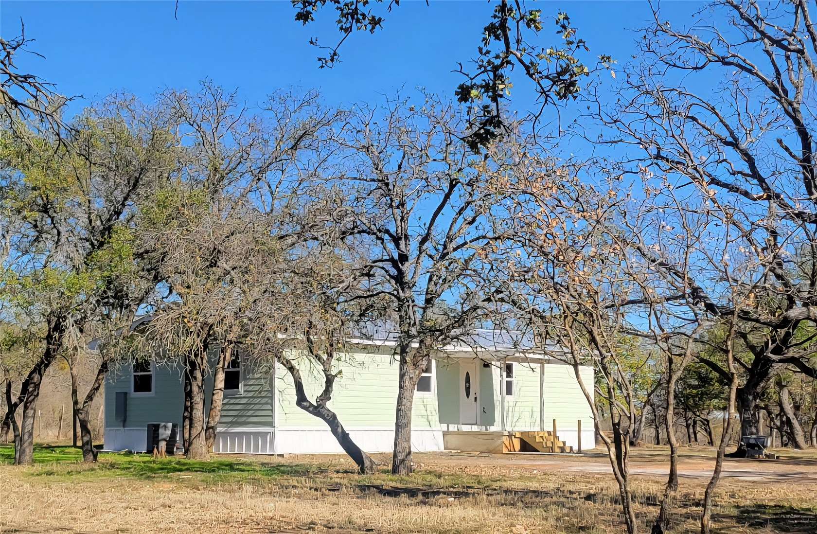 2.1 Acres of Land with Home for Sale in Bangs, Texas