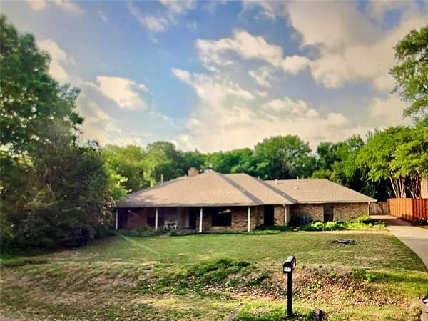 1.65 Acres of Residential Land with Home for Sale in Coppell, Texas