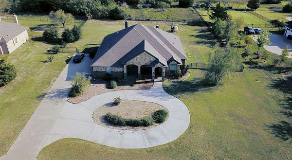 1.5 Acres of Land with Home for Sale in Rockwall, Texas