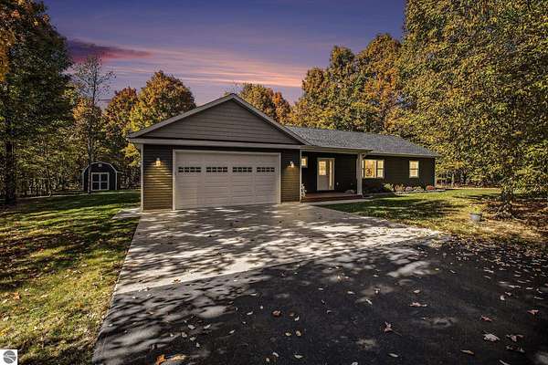 2.5 Acres of Residential Land with Home for Sale in Interlochen, Michigan