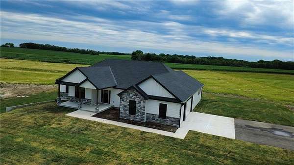 7.13 Acres of Land with Home for Sale in Smithville, Missouri