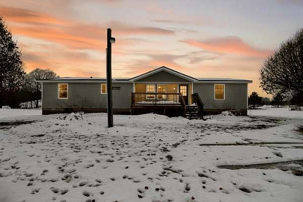 5.62 Acres of Residential Land with Home for Sale in Paris, Michigan