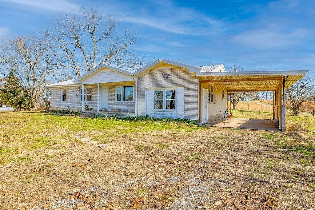 10.4 Acres of Land with Home for Sale in Minor Hill, Tennessee