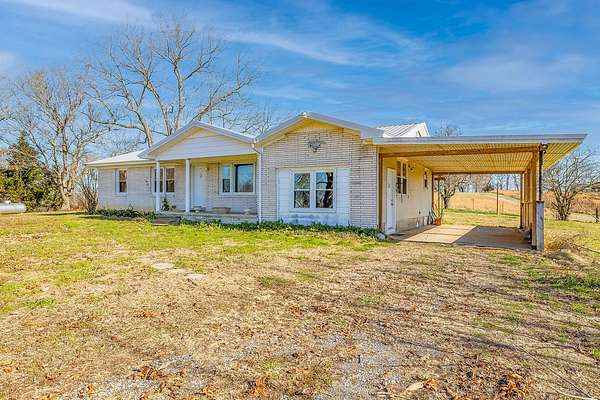 10.4 Acres of Land with Home for Sale in Minor Hill, Tennessee