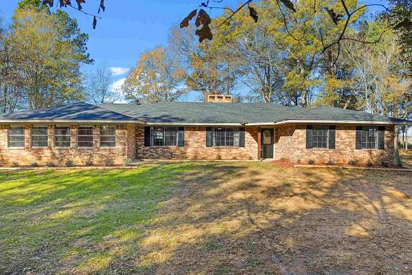 3.25 Acres of Residential Land with Home for Sale in Laneville, Texas