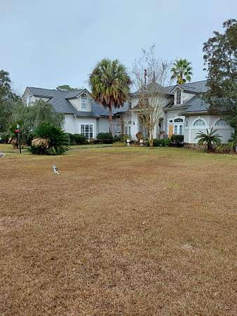5 Acres of Residential Land with Home for Sale in Quincy, Florida