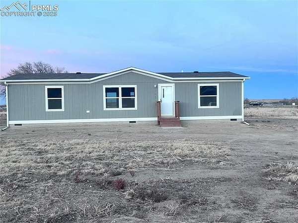 7.4 Acres of Residential Land with Home for Sale in Fountain, Colorado