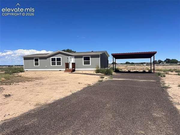 7.4 Acres of Land with Home for Sale in Fountain, Colorado