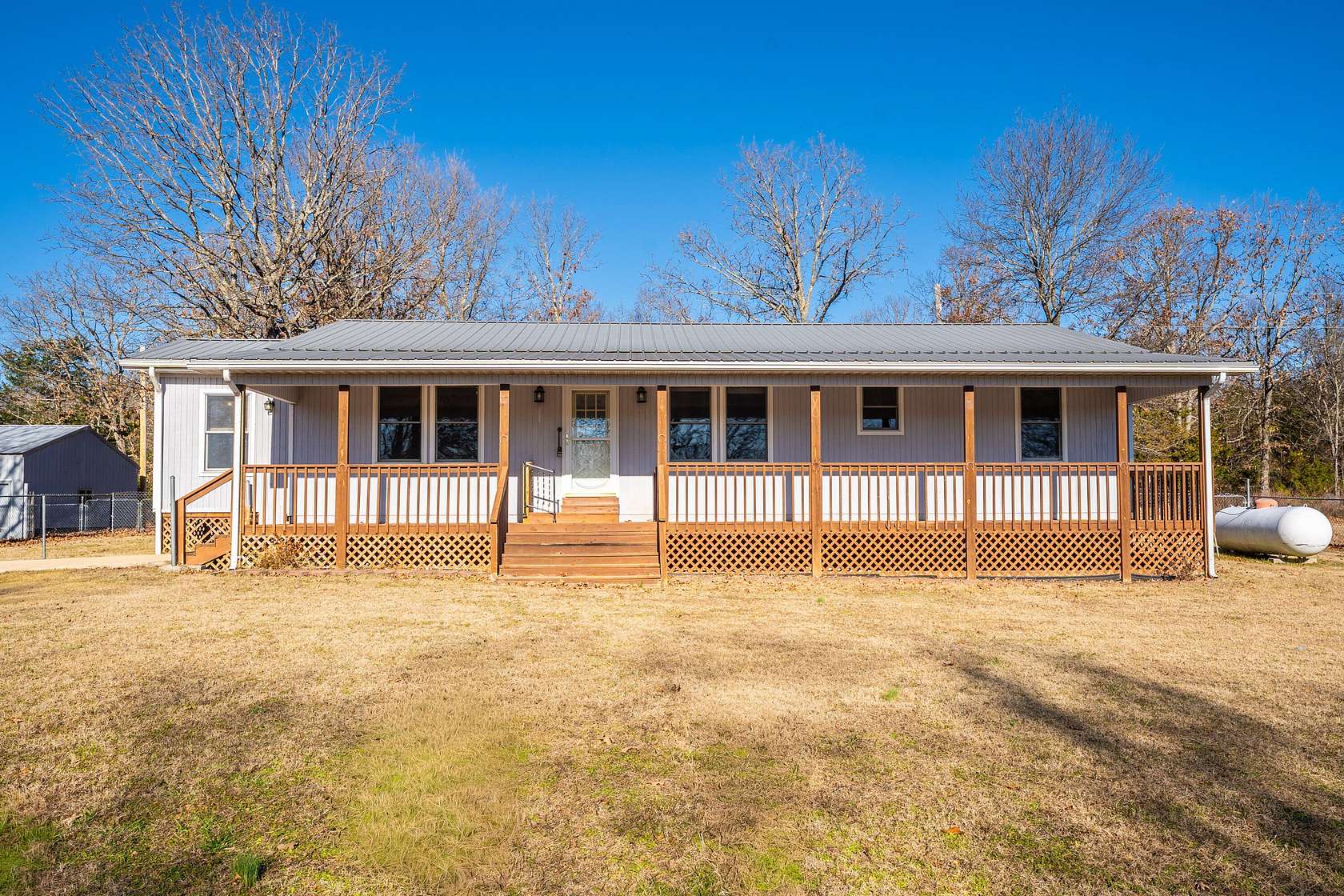 19 Acres of Recreational Land with Home for Sale in Protem, Missouri