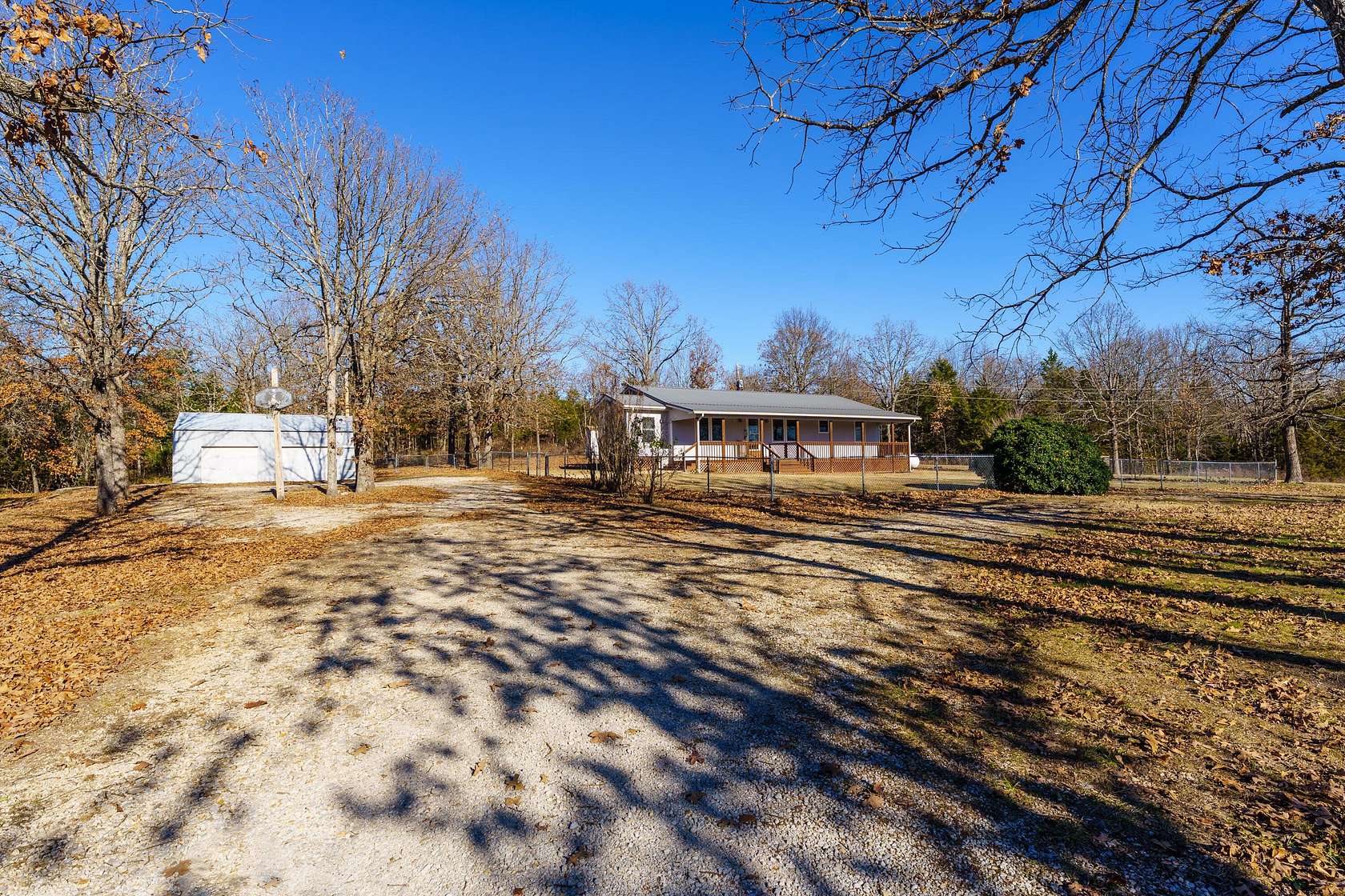 19 Acres of Recreational Land with Home for Sale in Protem, Missouri