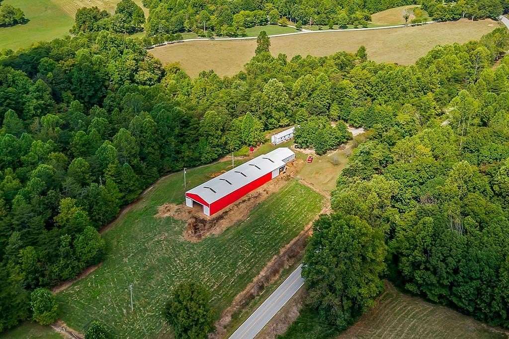 7.8 Acres of Land with Home for Sale in Hilham, Tennessee