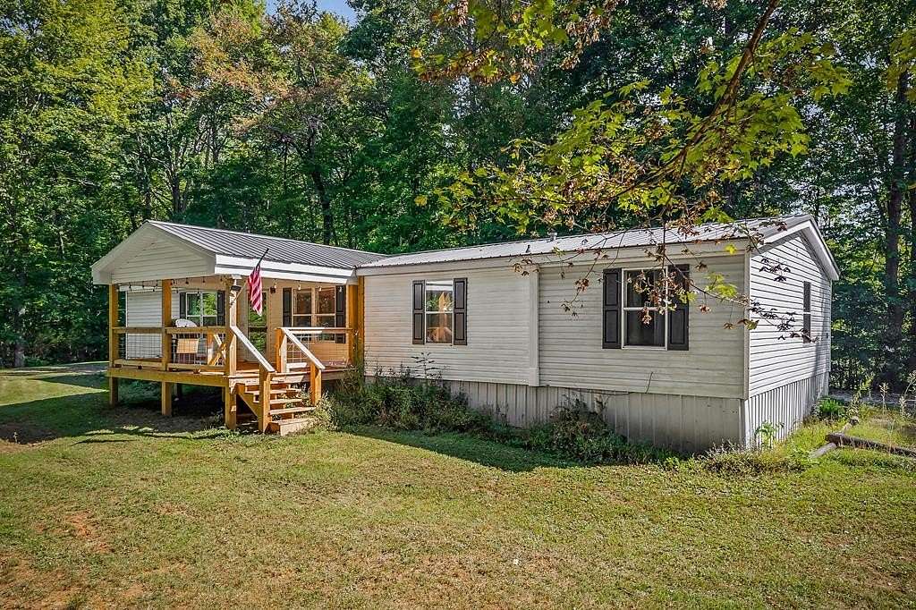 5 Acres of Residential Land with Home for Sale in Hilham, Tennessee