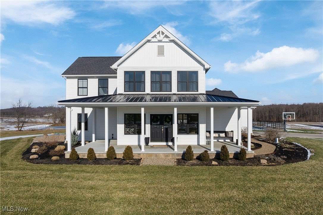 5.5 Acres of Residential Land with Home for Sale in North Lawrence, Ohio