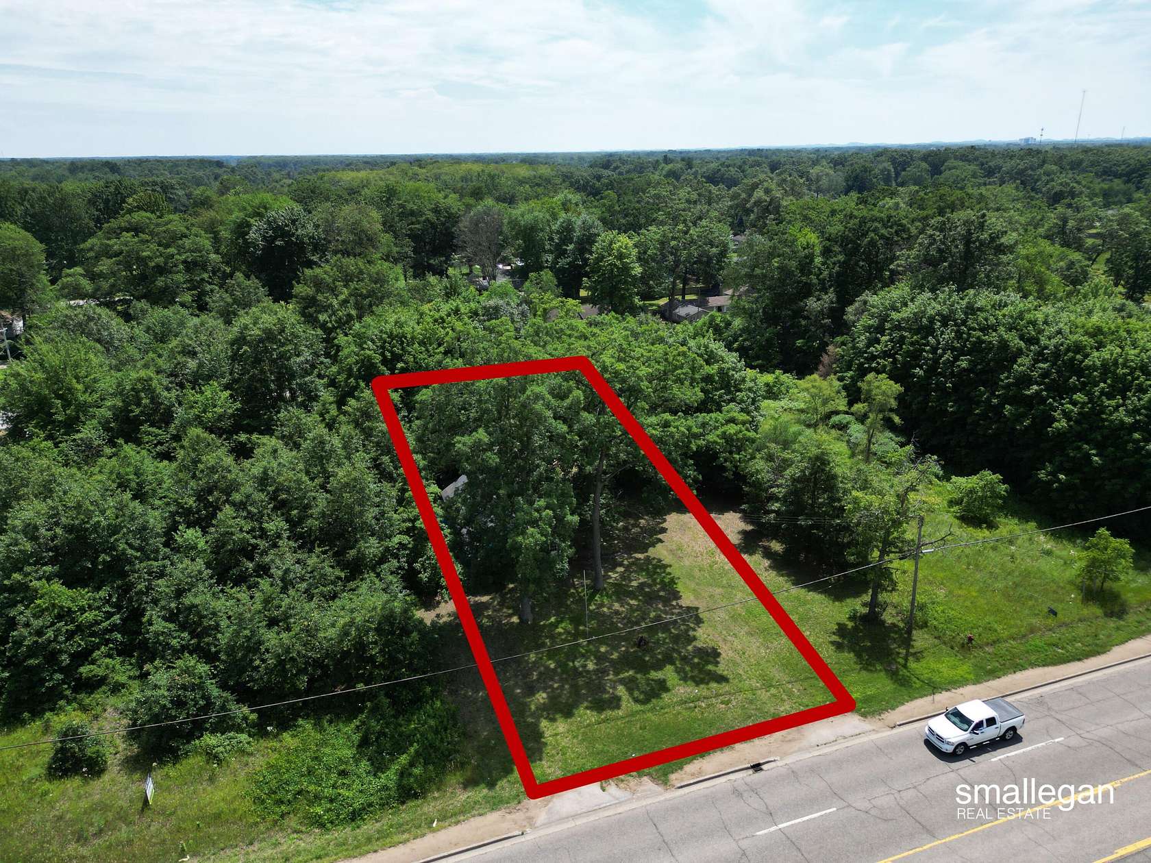 0.59 Acres of Commercial Land for Sale in Muskegon, Michigan