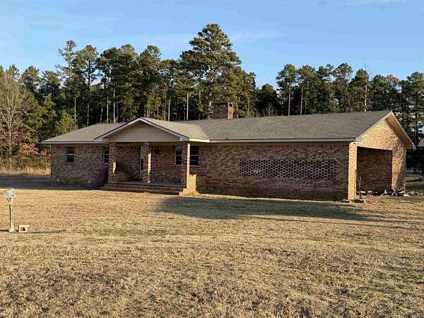2.36 Acres of Land with Home for Sale in Quitman, Arkansas