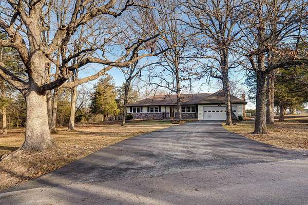 8.3 Acres of Residential Land with Home for Sale in Billings, Missouri