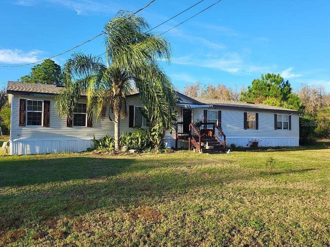 4 Acres of Residential Land with Home for Sale in Polk City, Florida