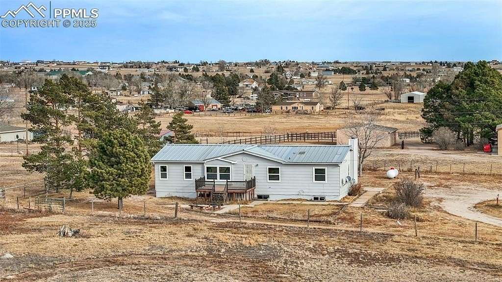 5 Acres of Land with Home for Sale in Peyton, Colorado