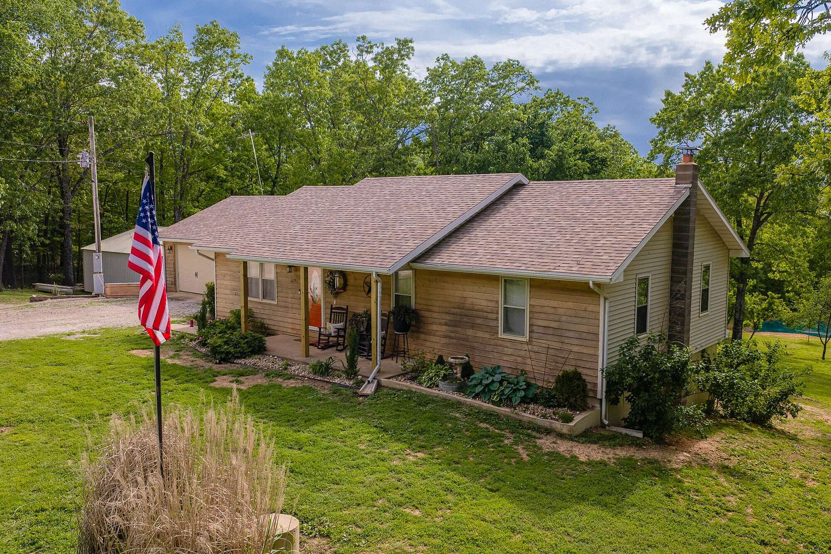 9.14 Acres of Land with Home for Sale in West Plains, Missouri