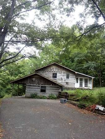 1.56 Acres of Land with Home for Sale in Pounding Mill, Virginia