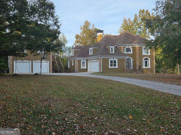 2.5 Acres of Residential Land with Home for Sale in Hampton, Georgia