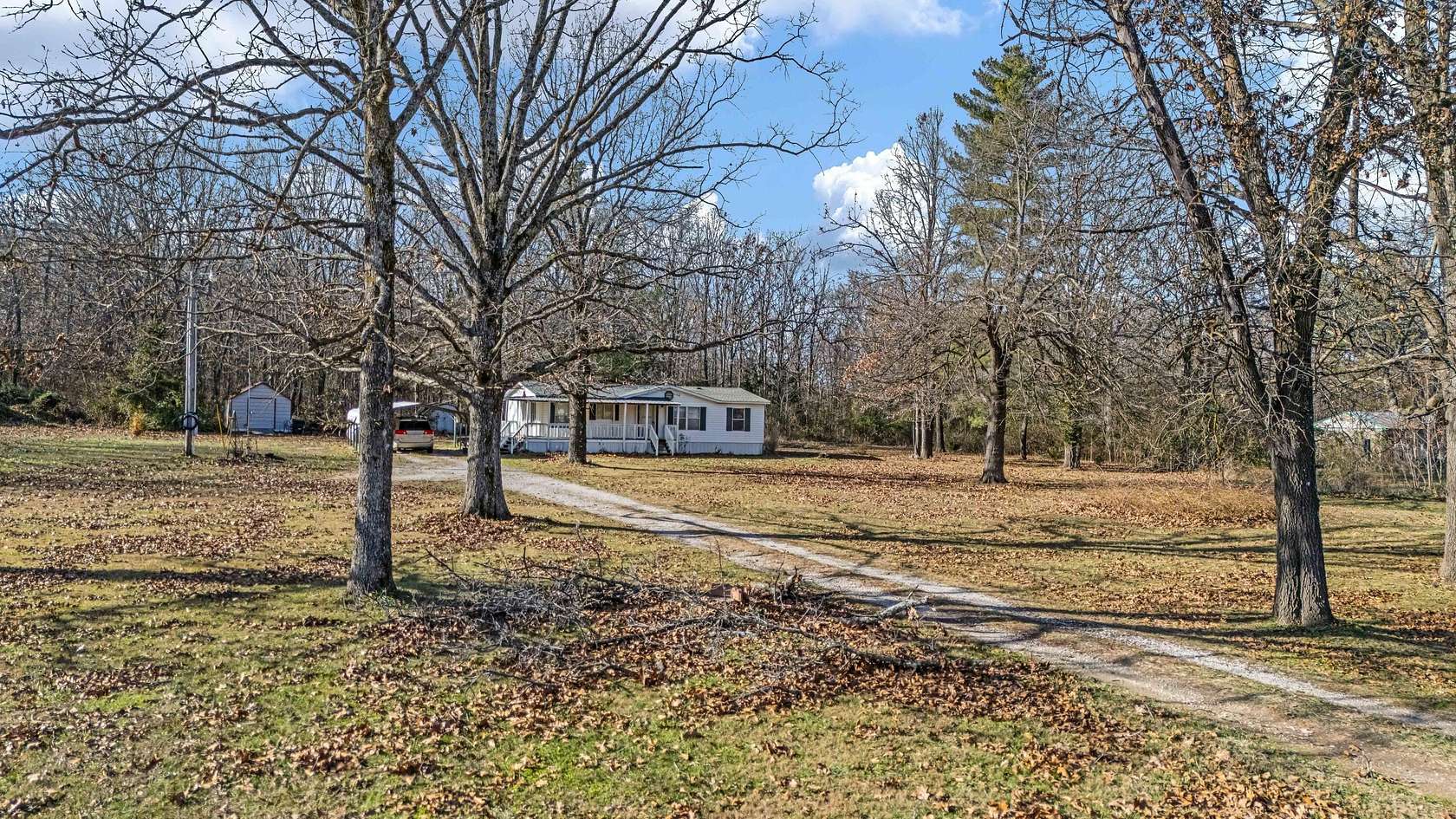 3 Acres of Residential Land with Home for Sale in Pomona, Missouri