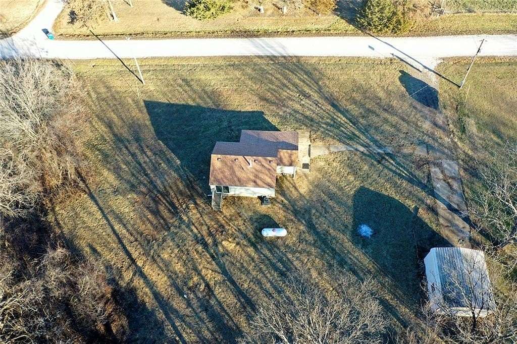 2.3 Acres of Residential Land with Home for Sale in Harrisonville, Missouri