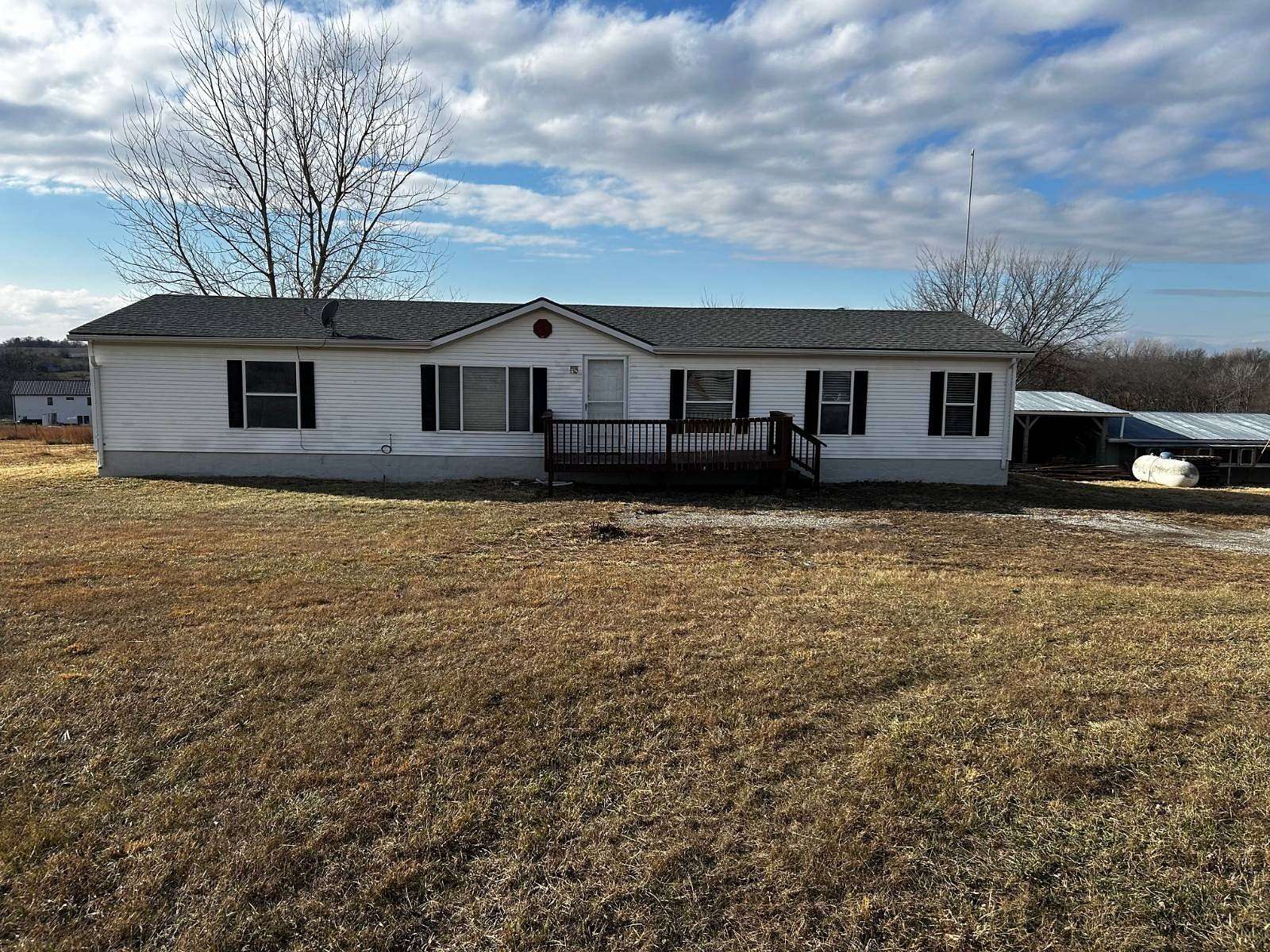 5 Acres of Residential Land with Home for Sale in Kidder, Missouri