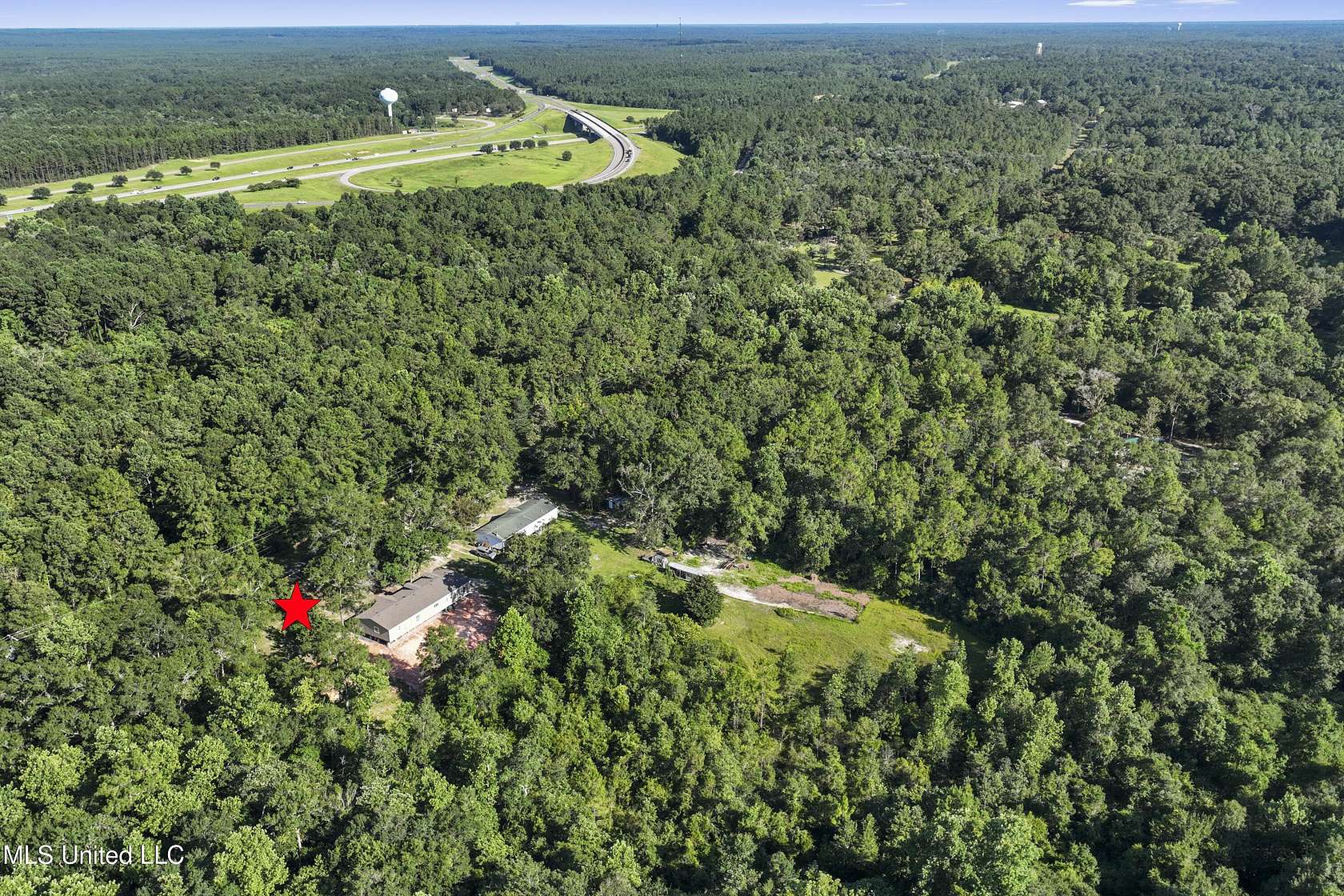 4.5 Acres of Residential Land with Home for Sale in Saucier, Mississippi