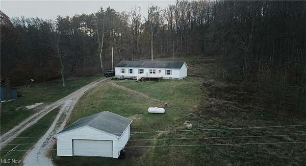 3.63 Acres of Residential Land with Home for Sale in Coshocton, Ohio