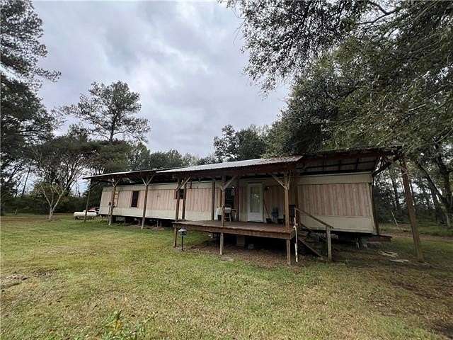 5.25 Acres of Residential Land with Home for Sale in Amite, Louisiana
