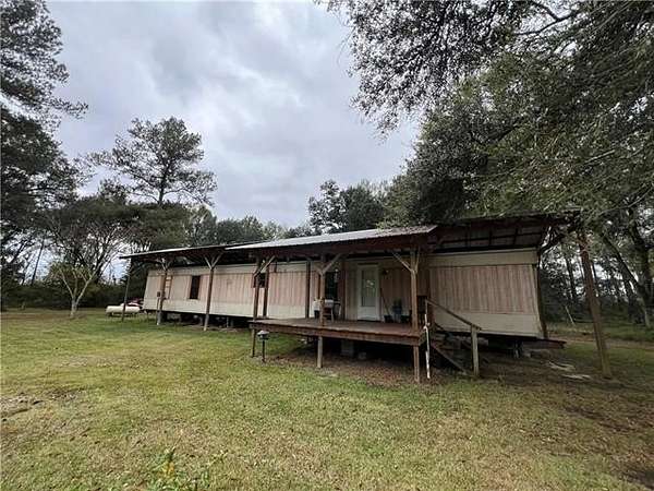 5.25 Acres of Residential Land with Home for Sale in Amite, Louisiana
