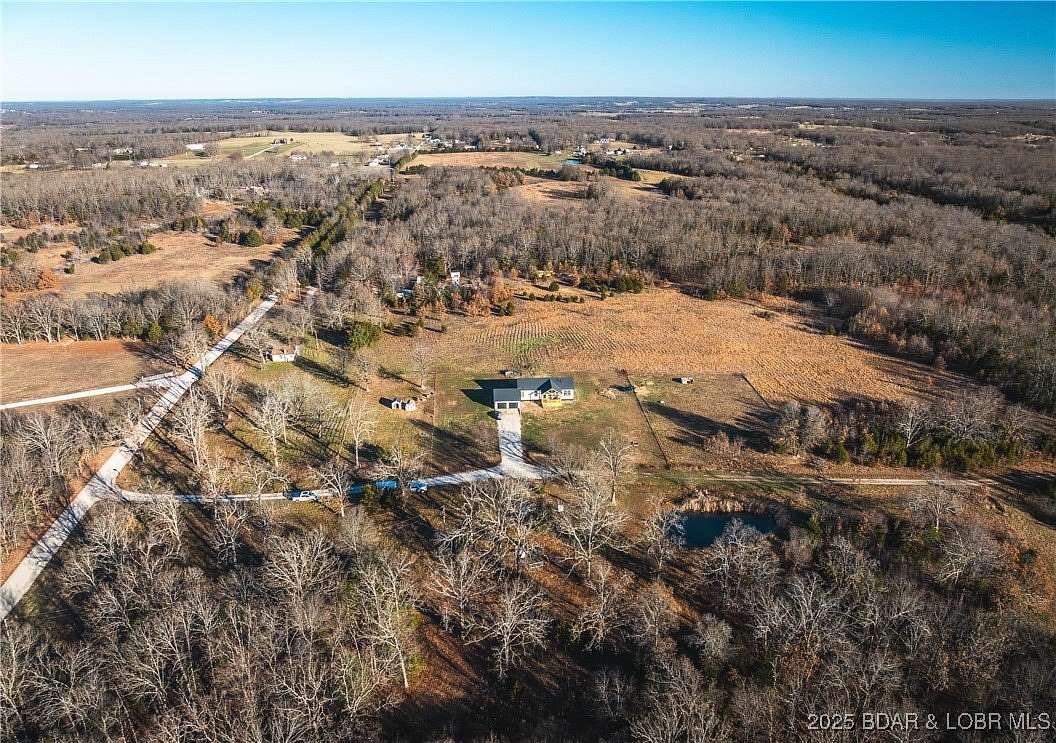 75.3 Acres of Land with Home for Sale in Lebanon, Missouri