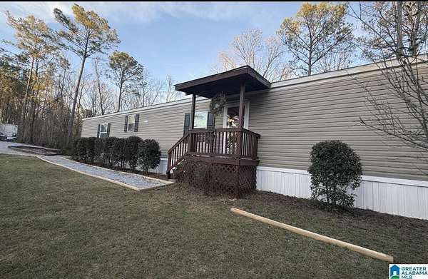 16.6 Acres of Land with Home for Sale in Columbiana, Alabama