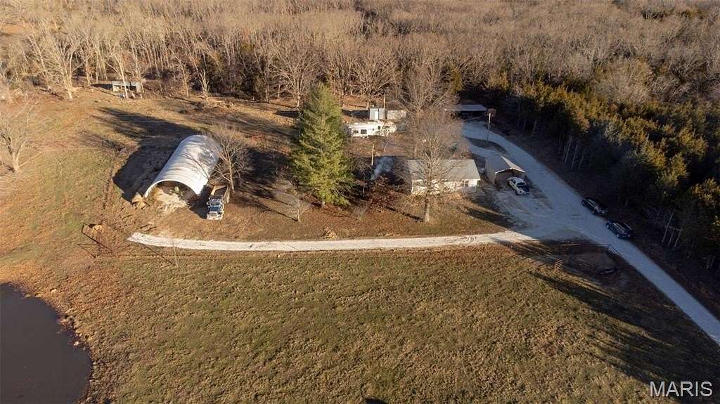 18.2 Acres of Land with Home for Sale in Vichy, Missouri