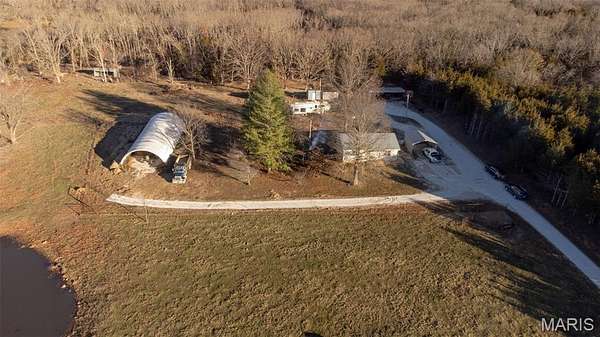 18.2 Acres of Land with Home for Sale in Vichy, Missouri