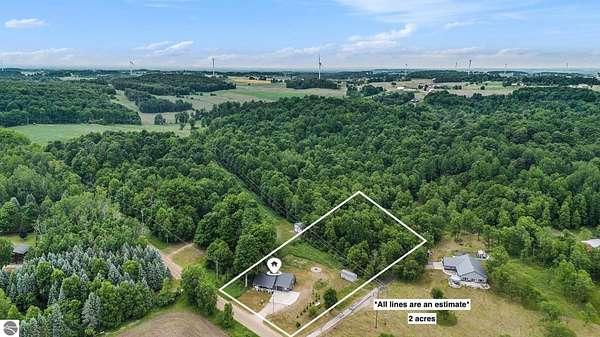 2 Acres of Land with Home for Sale in Tustin, Michigan