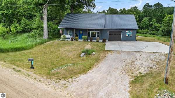 2 Acres of Land with Home for Sale in Tustin, Michigan