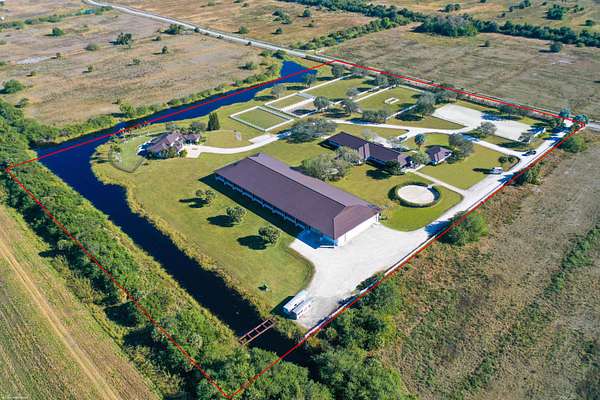 14.6 Acres of Land with Home for Sale in The Acreage, Florida