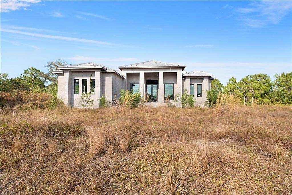 2.34 Acres of Residential Land with Home for Sale in Naples, Florida