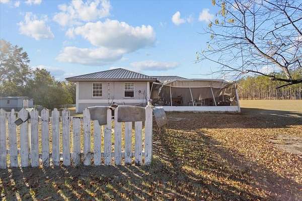 10 Acres of Land with Home for Sale in Live Oak, Florida