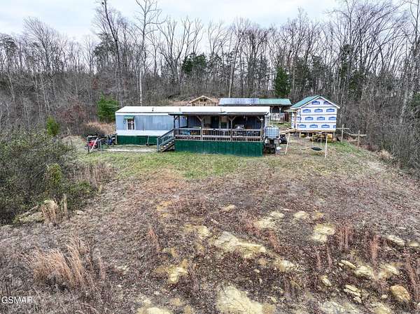 7.37 Acres of Land with Home for Sale in Bulls Gap, Tennessee