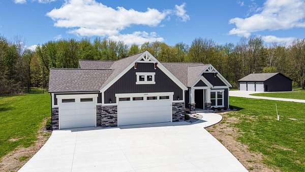 2.5 Acres of Land with Home for Sale in Bailey, Michigan